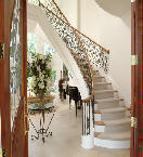 Grand stairways display the imagination of the proud home owner.